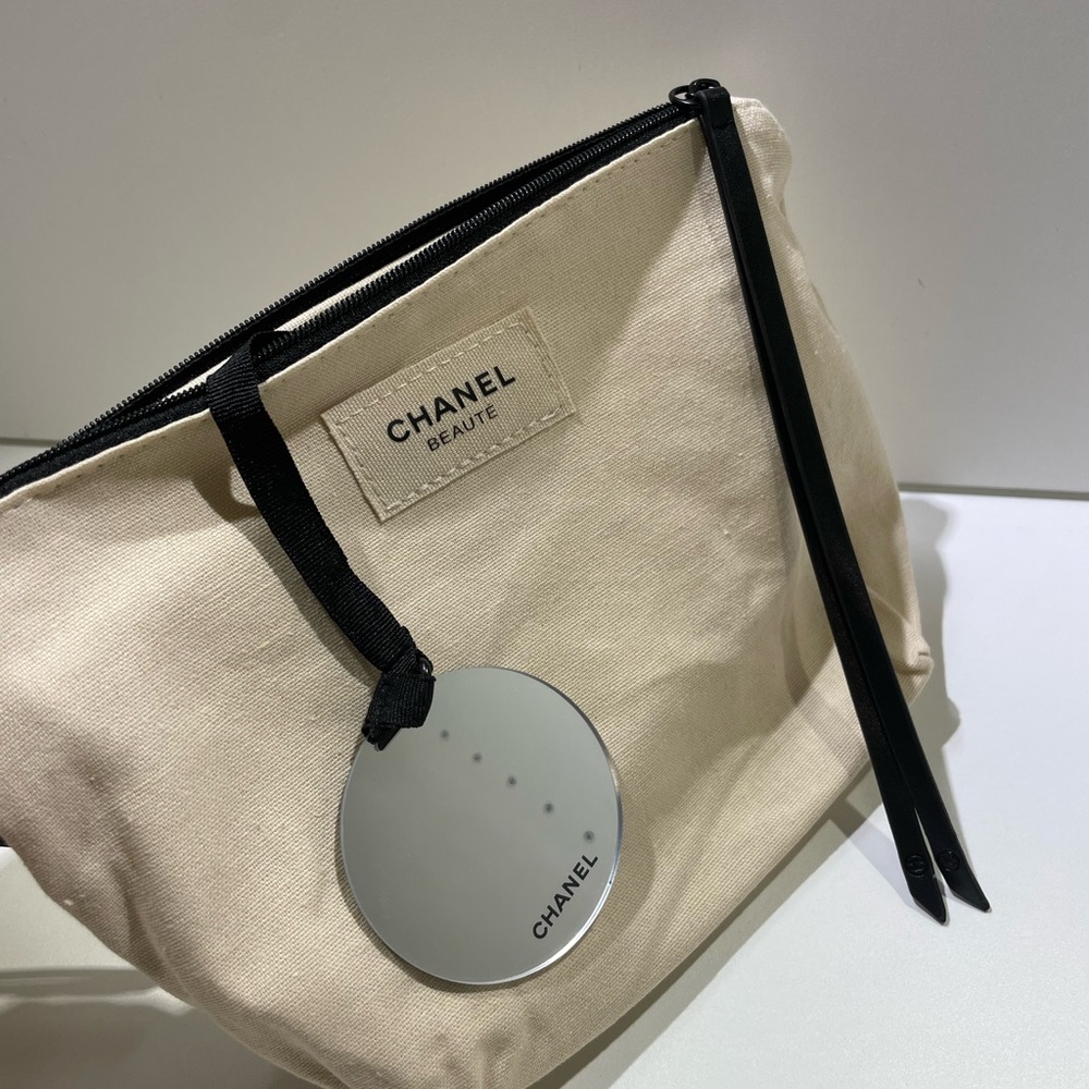 Cream Cosmetic Bag with Black Accents